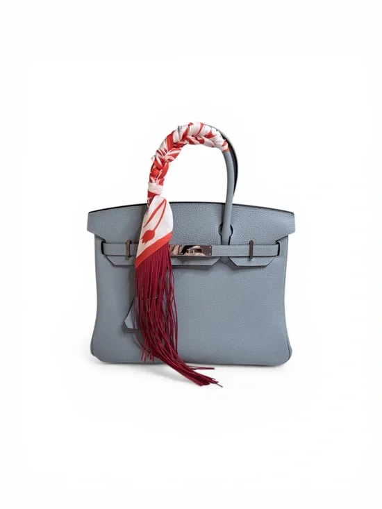 Trendy Fringe Handbag Wrap with Orange Fringe and Bold White Flower Pattern - Picture 9 of 10